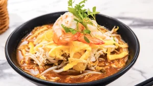 Kelezatan Laksa Sarawak: Mie Kuah Berpadu Ayam Dan Udang